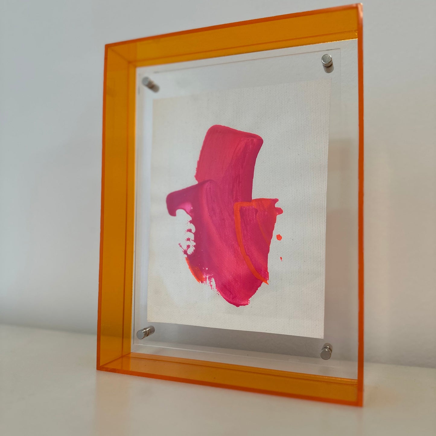 pink abstract painting of a banana